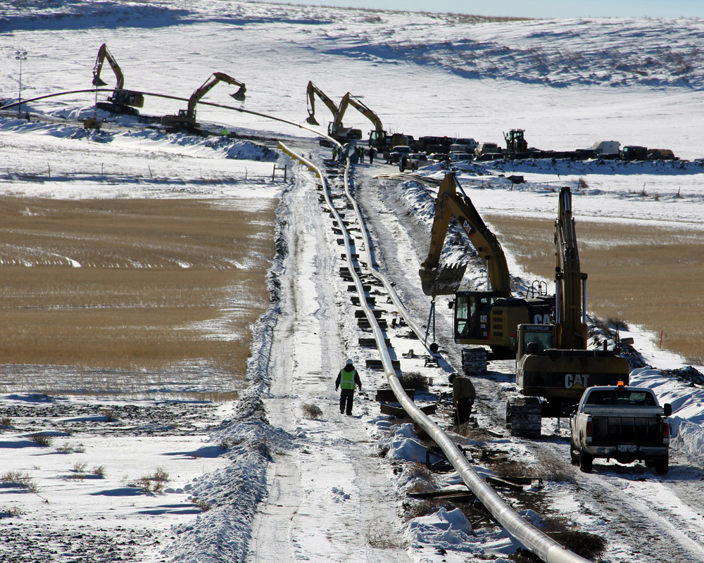 Pipelines carry some of the oil and natural gas liquids (NGL). This picture shows construction of the BakkenLink Pipeline. BakkenLink will carry crude oil about 130 miles through Billings, McKenzie, Stark and Williams Counties.