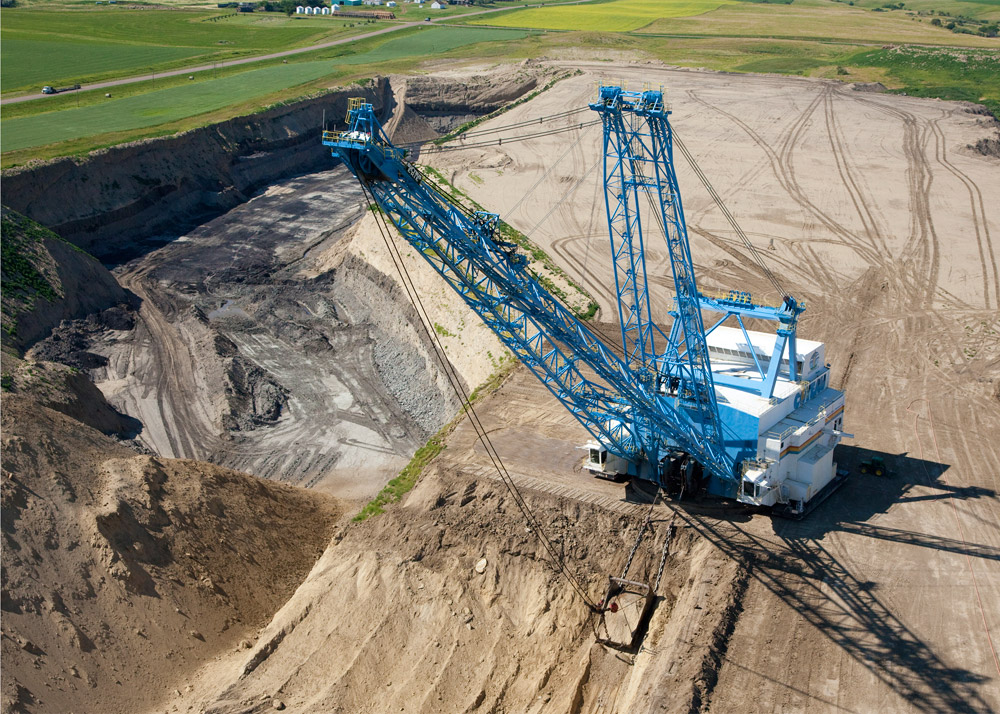 A dragline at the Freedom Mine near Beulah digs into the earth.