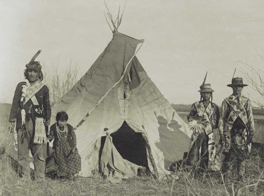 Chippewa family next to their tipi
